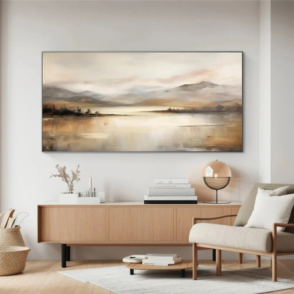 Soft abstract mountain and lake painting above a light wood console by Wonder Artwork